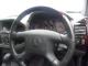 Mistubishi_Pajero_1999_Blue_steeringWheel_dashboard.JPG