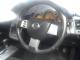 Nissan_Marano_2005_Black_steeringwheel_dashboard.JPG