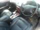 Toyota_Bravis_2002_Silver_car_frontseats_gears_dashboard_steeringwheel1.JPG