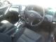Toyota_Kluger_silver_2001_car_frontseats_dashoboard_steeringwheel_gears1.JPG