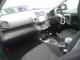 Toyota_RAV4_2005_Black_frontseats_steeringwheel_carradio_gears.JPG