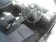 Toyota_Runix_2001_Silver_car_frontseats_gears_dashboard_steeringwheel.JPG